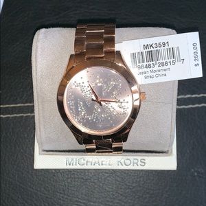 NWT. Rose gold Michael Kors watch.